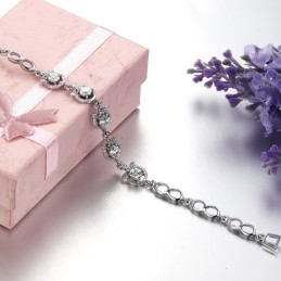 Kvalita A Kvantita Zaručená Ženský Náramok S m Pokovovaním A Titánovým Vzorom V Tvare Ďateliny